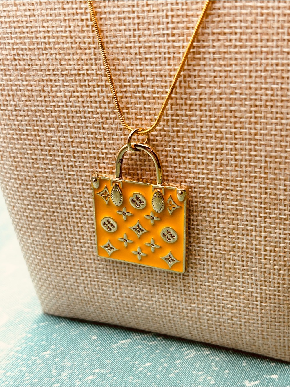 Louis Vuitton gold and yellow shopping bag necklace 24 inch gold chain new